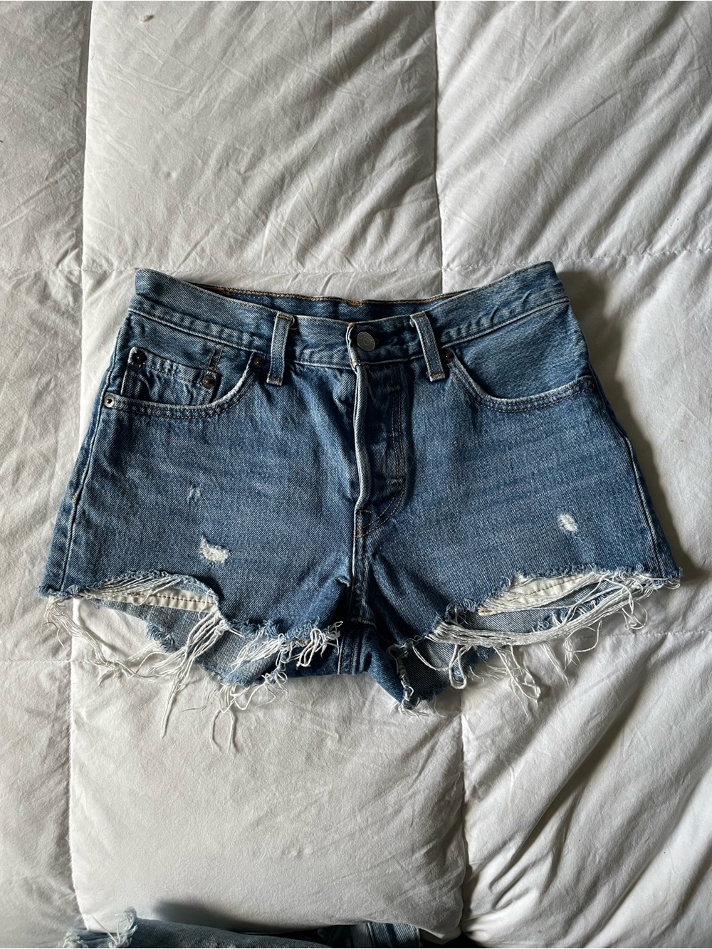 Levi's Distressed High-Rise Blue Denim Cutoff Shorts